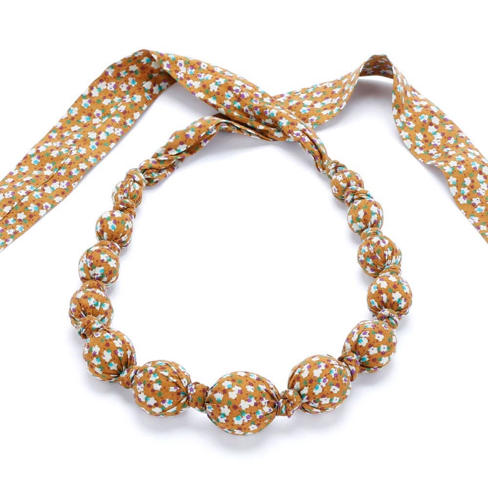 Little Girls Beaded Fabric Necklace - Star Burst Print