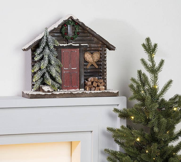 Winter Cabin Facade with Tree